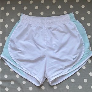 white and teal nike shorts